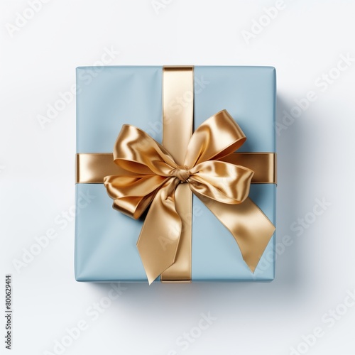 Elegant blue and golden gift box with luxurious satin ribbon