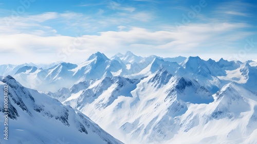 Panoramic view of winter mountains. Panoramic view of snowy alpine peaks.