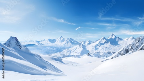 Winter mountains panorama with snowdrifts and blue sky with clouds
