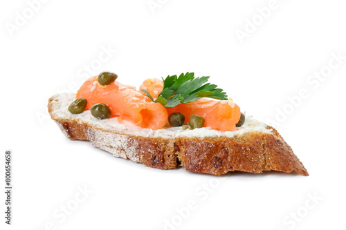 Tasty canape with salmon, capers and cream cheese isolated on white