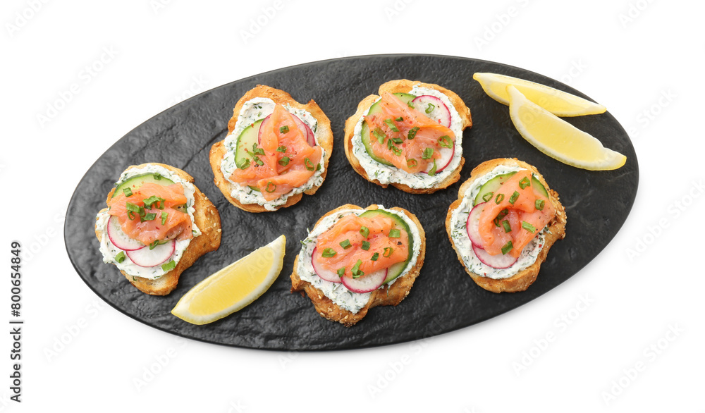 Tasty canapes with salmon, cucumber, radish and cream cheese isolated on white, top view Tasty canapes with salmon, cucumber, radish and cream cheese isolated on white, top view