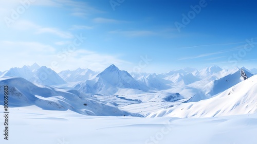 Panorama of snow-capped mountains and blue sky in winter © I