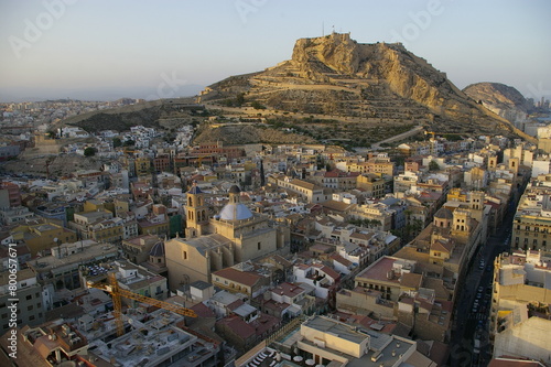 Vista general de la ciudad de Alicante desde lo alto con luz de atardecer photo