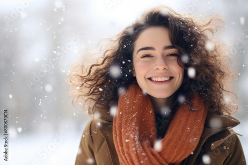Joyful woman enjoying the winter snow