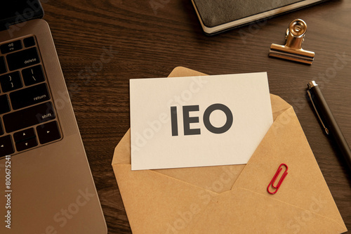 There is word card with the word IEO. It is an abbreviation for Initial Exchange Offering as eye-catching image. photo