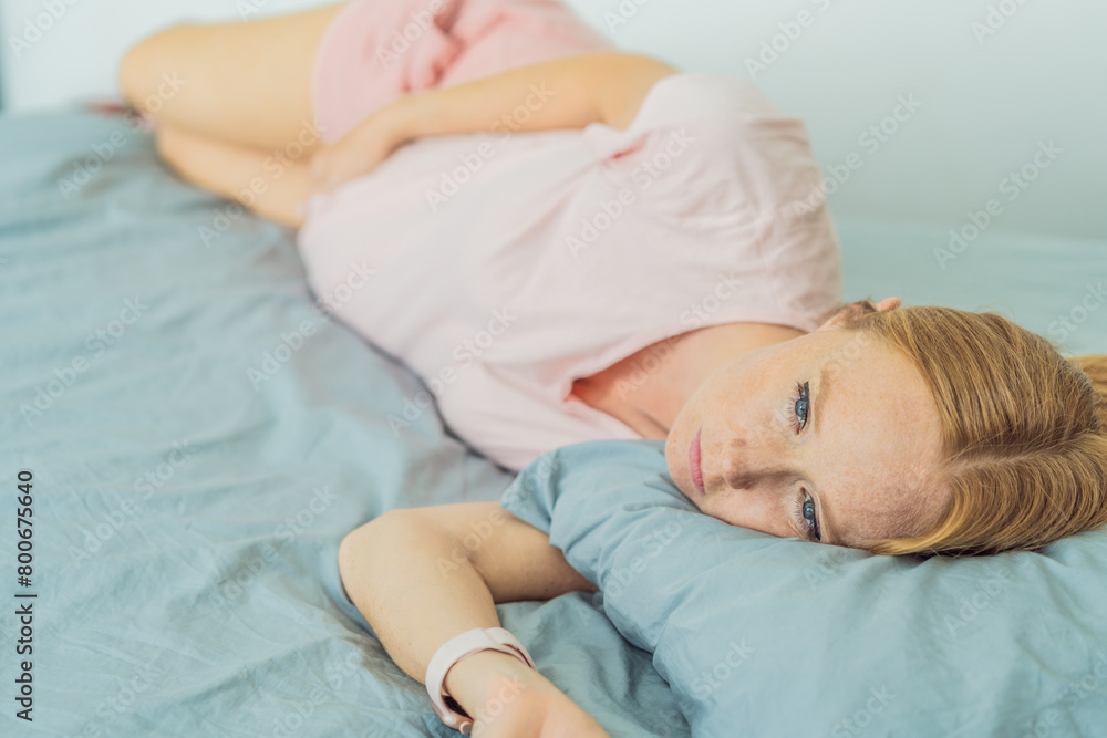 Sleep-deprived pregnant woman struggles with insomnia, navigating the challenges of restlessness during pregnancy Sleep-deprived pregnant woman struggles with insomnia, navigating the challenges of restlessness during pregnancy