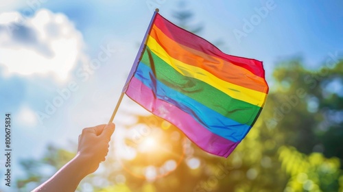Pride in Motion  One Person Waving Rainbow Flag