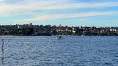 Sydney Harbour forshore viewed from the Gardens in NSW Australia on a nice sunny and partly cloudy afternoon blue skies photo