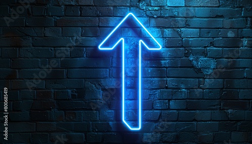 a blue neon arrow sign on a black background