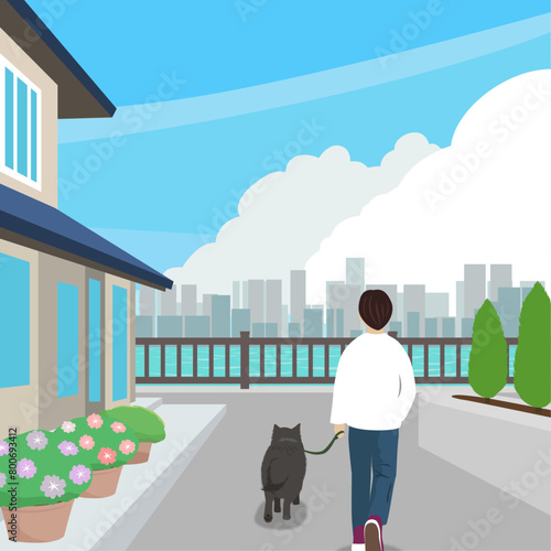 住宅街を犬と散歩する人