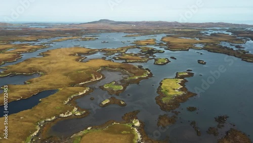 North Uist, Outer Hebrides, Scotland. Video aerial pano East to South over scattered islands of tidal Loch Maddy from Loch an Duin