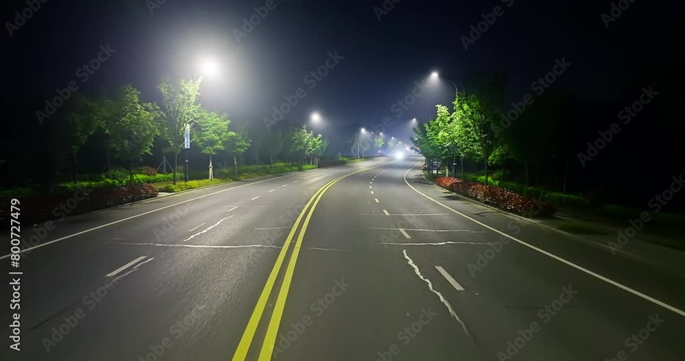 Forward shot of empty asphalt road landscape at night Forward shot of empty asphalt road landscape at night
