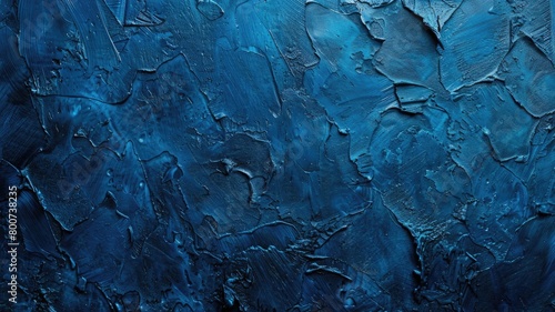 Textured blue abstract background with brush strokes and detail © Artyom