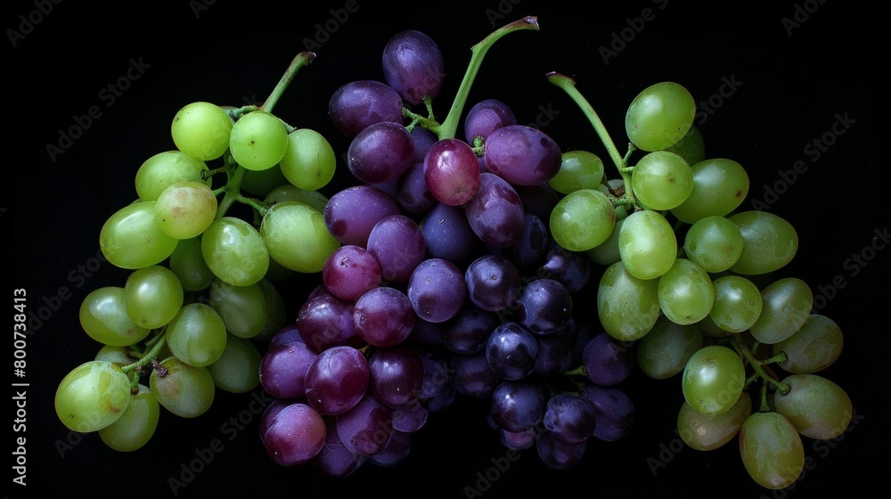 Purple and green grapes in bunches on a black background generative ai