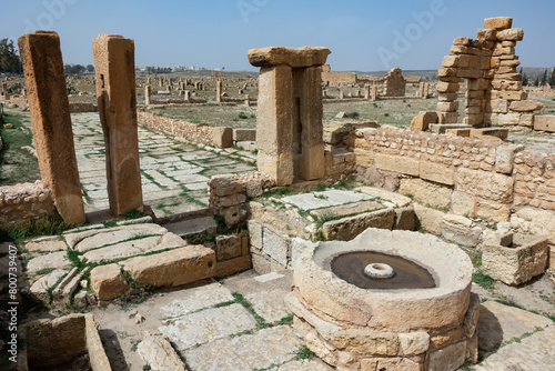 Round-shaped carved rock, Olive oil presses at archaeological site in roman ancient city Sufetula in Sbeitla, Tunisia