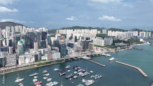 Experience the vibrant transformation of Hong Kong's industrial districts into modern commercial hubs, offering breathtaking waterfront views of Victoria Harbour photo