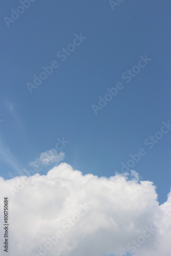 Blue sky with white clouds. Blue background. The summer sky is colorful clearing day and beautiful nature in the morning. for backdrop decorative and wallpaper design.