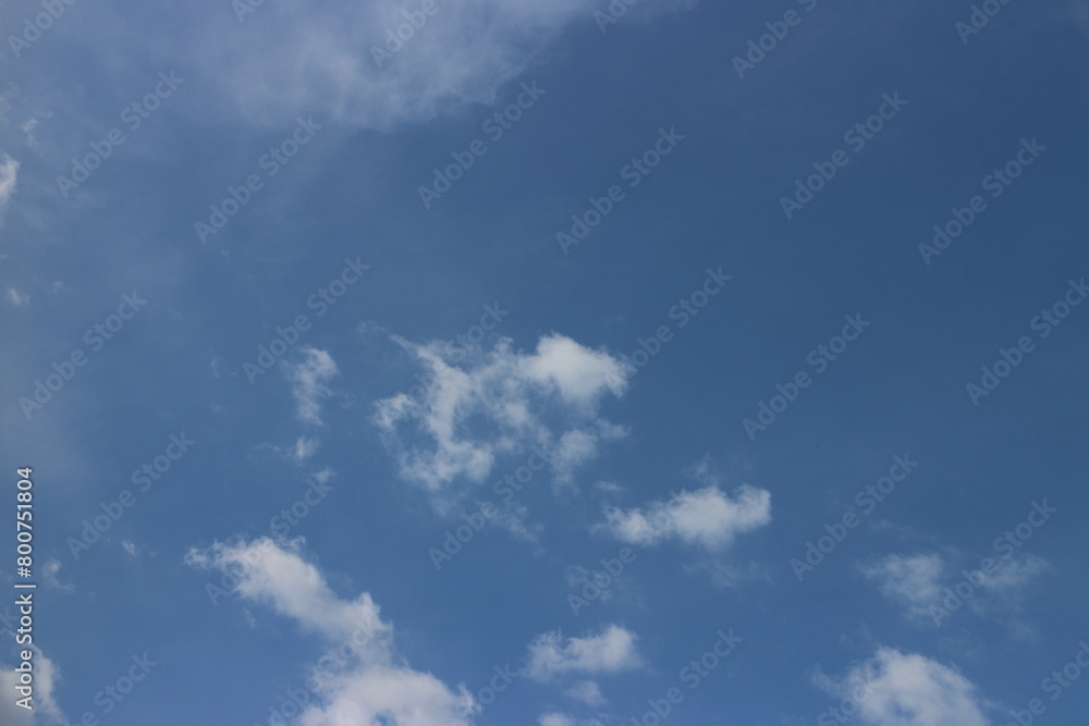 Blue sky with white clouds. Blue background. The summer sky is colorful clearing day and beautiful nature in the morning. for backdrop decorative and wallpaper design. The perfect sky background. Blue sky with white clouds. Blue background. The summer sky is colorful clearing day and beautiful nature in the morning. for backdrop decorative and wallpaper design. The perfect sky background.
