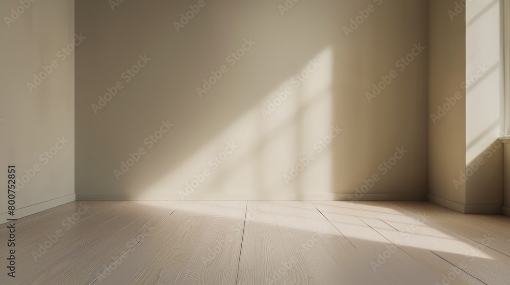 A room with a large window and a white wall. The room is empty and has a lot of natural light coming in from the window A room with a large window and a white wall. The room is empty and has a lot of natural light coming in from the window