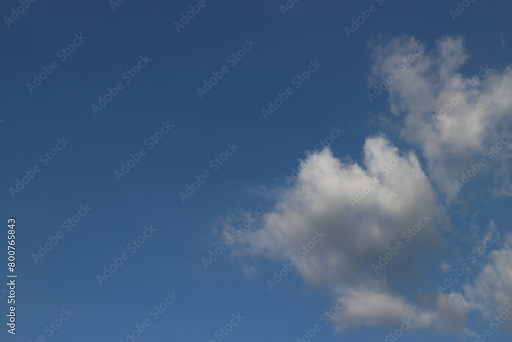 Fototapeta premium blue sky background with tiny clouds