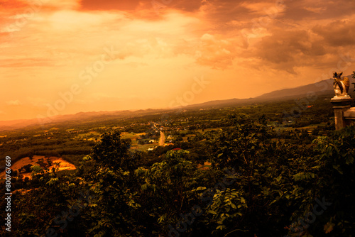 The panoramic view captures the mountainous atmosphere from a wide angle perspective.