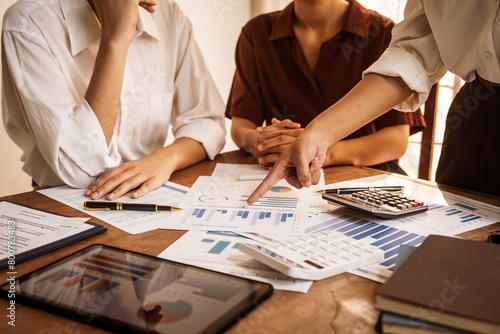 Analyzing startup group meetings to offer advice and make decisions. We assess discussions, offer insights, and assist in reaching conclusions for better business outcomes, hands close up at desk.