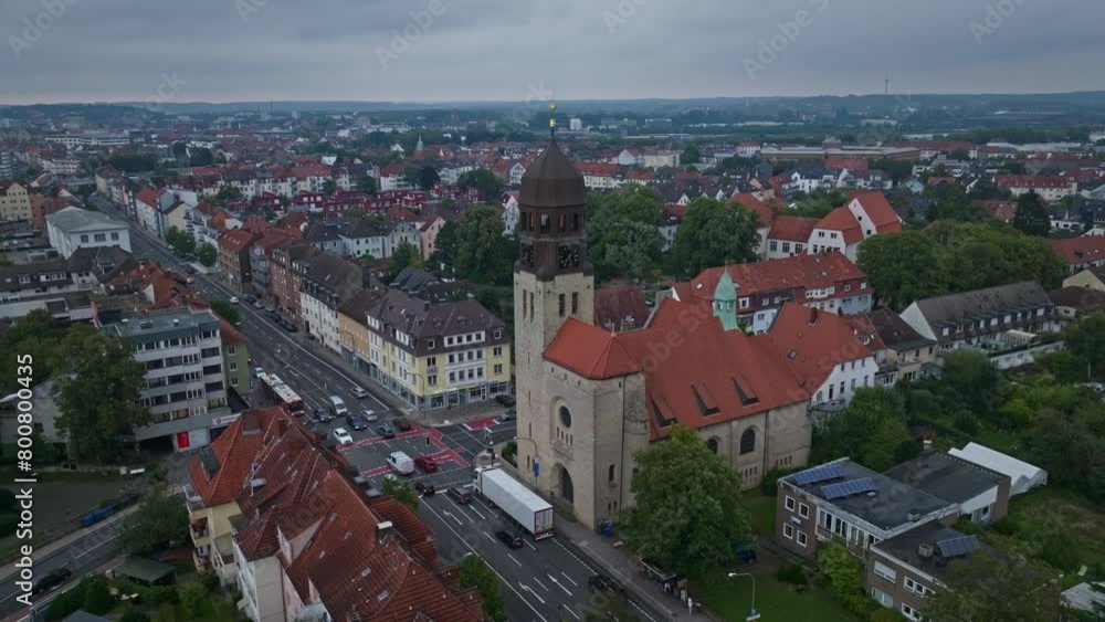 Aerial drone view of Lutherkirche in Osnabrück, Germany. The Lutheran Church is located in the southern part of the city and serves as an evangelical Lutheran church. Aerial drone view of Lutherkirche in Osnabrück, Germany. The Lutheran Church is located in the southern part of the city and serves as an evangelical Lutheran church.