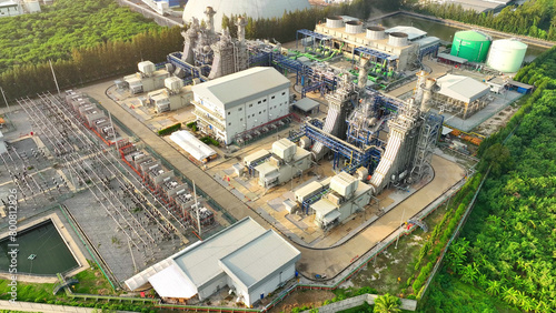 Combined-Cycle Power Plant  Efficient electricity generation using gas and steam turbines  minimizing waste heat. Electrical energy concept. Bird s eye view by drone.   