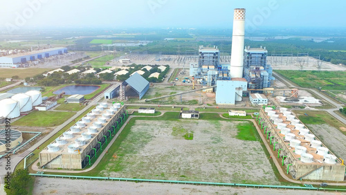 Contemporary Thermal Power Plants incorporate advanced technologies for cleaner energy production  reducing environmental impact through emissions control and improved efficiency. Aerial view drone. 