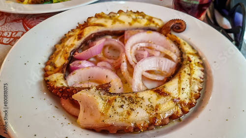 Octopus prepared the Greek way with onions and olive oil in luxury authentic gourmet restaurant in Thessaloniki, Central Macedonia, Greece, Europe. Octopus salad. Mediterranean cuisine delicacies