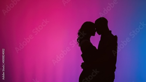 Solid Colored background shows a couples silhouette 