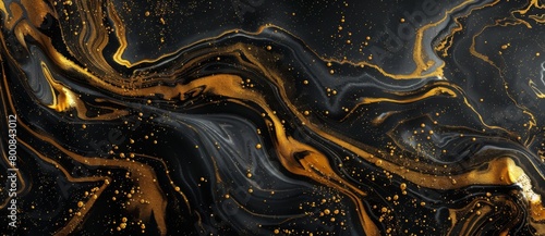 Black and gold abstract background with a liquid marble texture