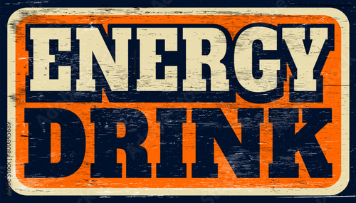 Aged and worn energy drink sign on wood