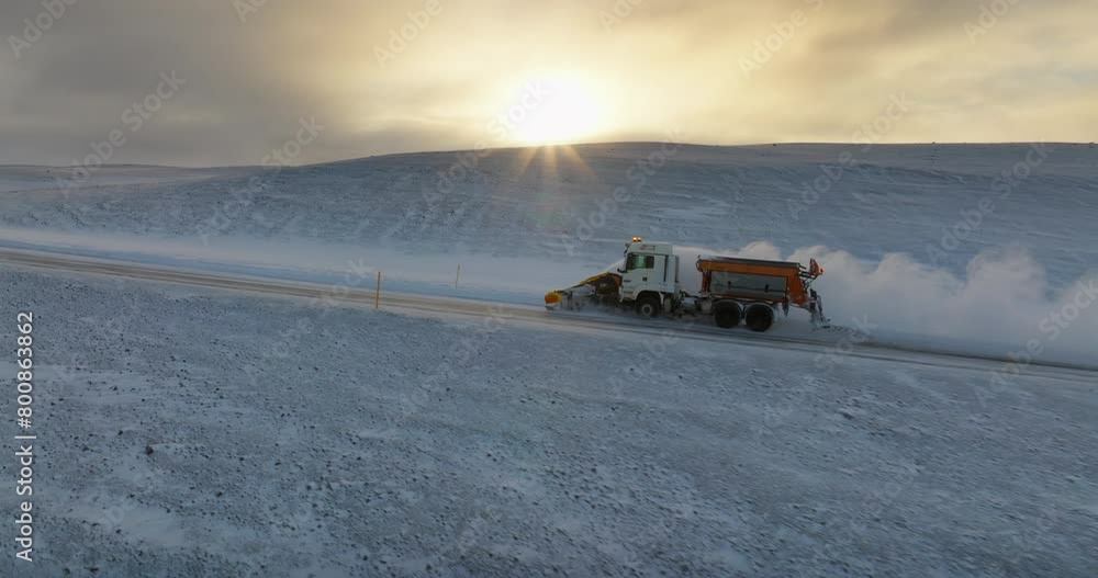 Snowplow Truck Clearing Snowy Road In Iceland Snowplow Truck Clearing Snowy Road In Iceland