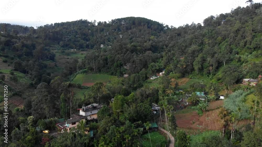 Aerial View of Remote Homes in Green Mountains in Ella, Sri Lanka Aerial View of Remote Homes in Green Mountains in Ella, Sri Lanka