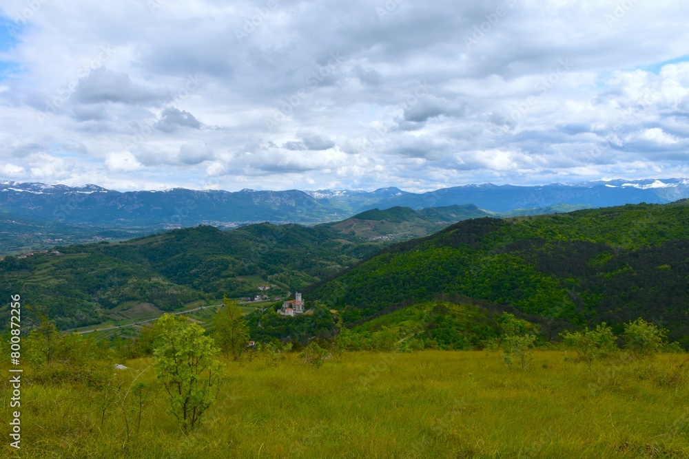 View of Vipava valley and Trnovo forest plateau and Rihemberk castle bellow from Kras in Primorska, Slovenia