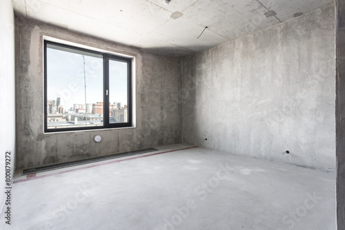 interior of the apartment without decoration in gray colors. rough finish