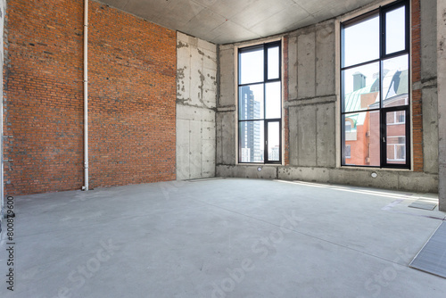 interior of the apartment without decoration in gray colors. rough finish