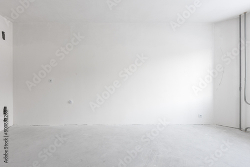 interior of the apartment without decoration in gray colors. rough finish