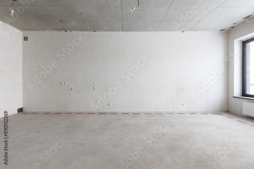 interior of the apartment without decoration in gray colors. rough finish