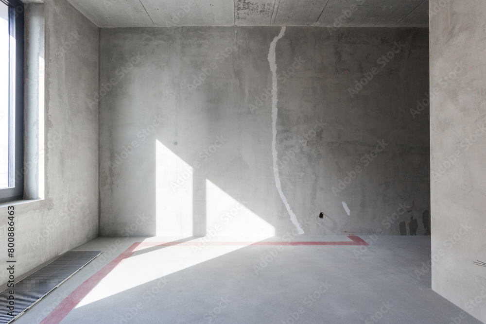 interior of the apartment without decoration in gray colors. rough finish interior of the apartment without decoration in gray colors. rough finish