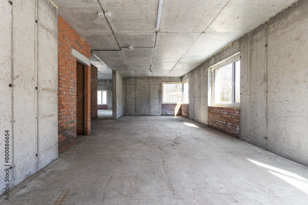 interior of the apartment without decoration in gray colors. rough finish interior of the apartment without decoration in gray colors. rough finish