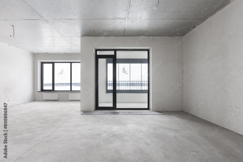 interior of the apartment without decoration in gray colors. rough finish interior of the apartment without decoration in gray colors. rough finish
