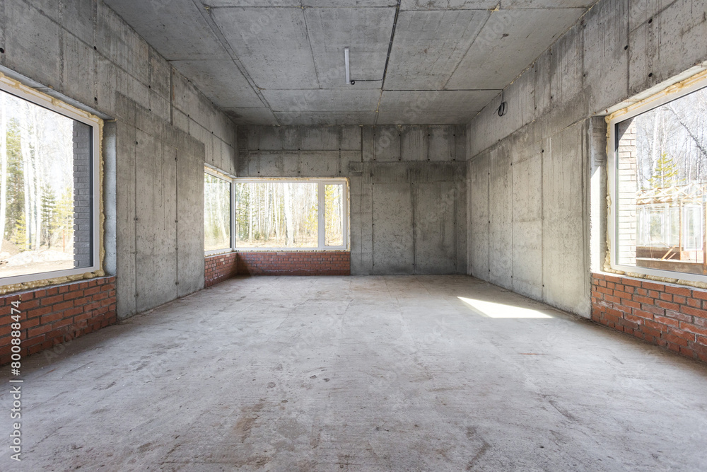 interior of the apartment without decoration in gray colors. rough finish interior of the apartment without decoration in gray colors. rough finish