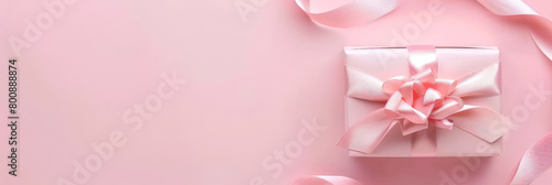 pink gift boxes with pink ribbons on pink background with empty space for text, top view, Mother's Day memories concept, banner christmas, holiday,birthday party © Planetz