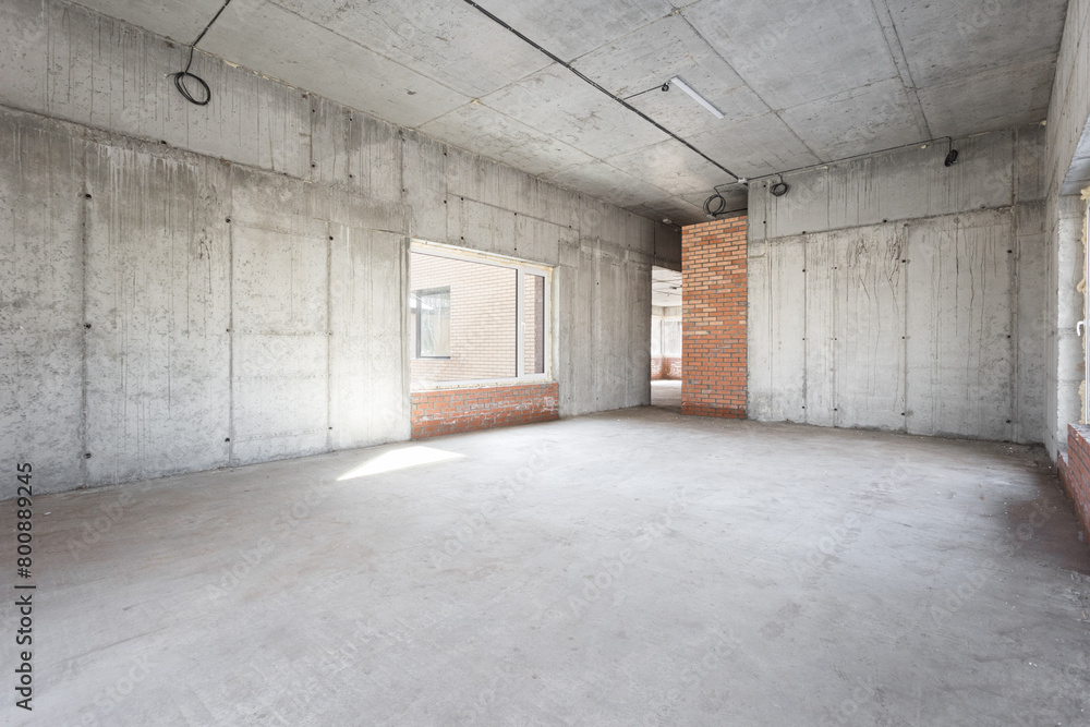 interior of the apartment without decoration in gray colors. rough finish interior of the apartment without decoration in gray colors. rough finish