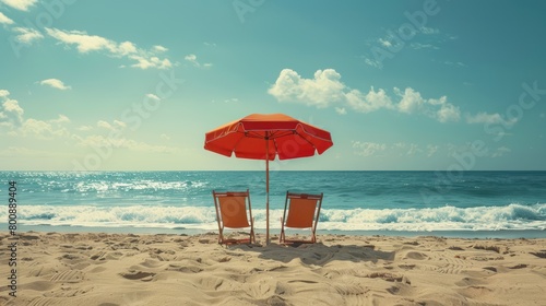 Beach chair and umbrella on the sand with sea and sky background photo