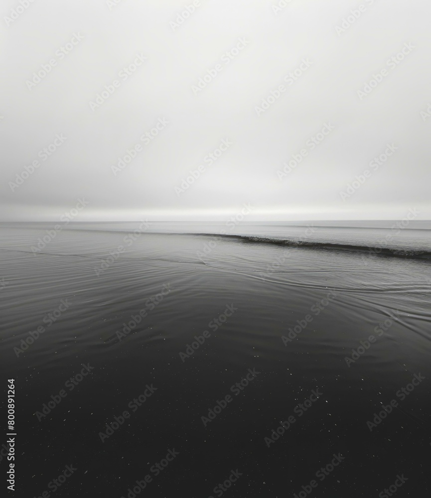 Fototapeta premium Black and white photo of a calm sea