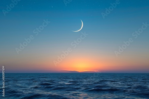 Waxing crescent moon in twilight sky heralding new beginnings with promise of fresh starts