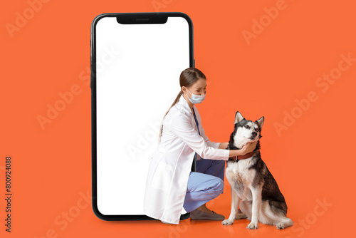 Veterinarian with cute dog ...